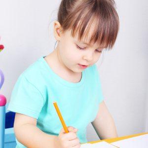autistic child writing