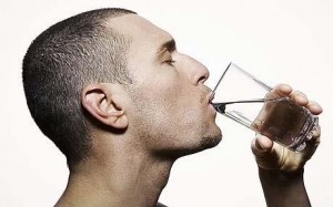 man drinking water